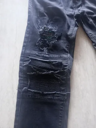 Jeans strappati uomo