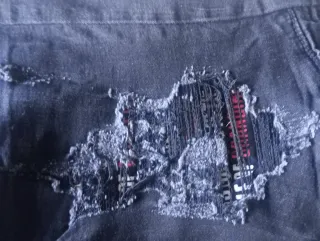 Jeans strappati uomo