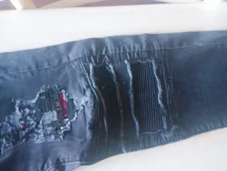 Jeans strappati uomo