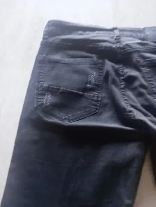 Jeans strappati uomo