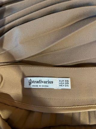 Falda larga marrón plisada