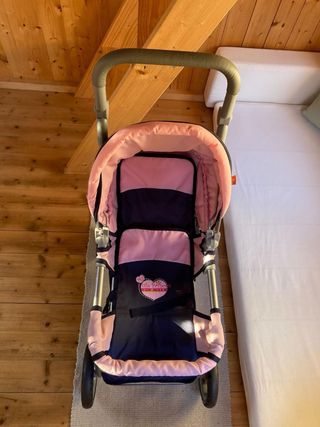 Cochecito de juguete para muñecas doble.