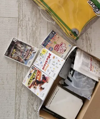 Consola Nintendo Wii + Juegos y Accesorios