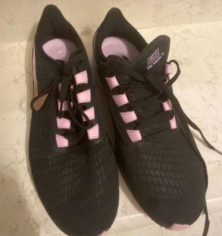 Scarpe running Nike nere e rosa