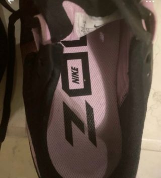 Scarpe running Nike nere e rosa