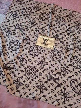 Pañuelo  con monedero a juego