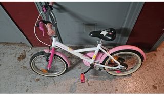 Bicicleta infantil rosa y blanca