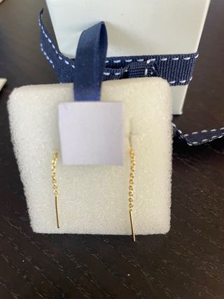 Orecchini a pendente in argento dorato con zircone