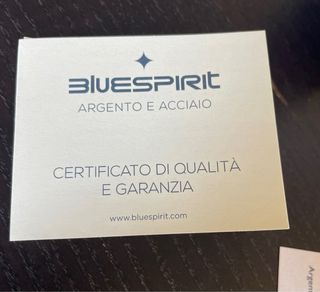 Orecchini a pendente in argento dorato con zircone