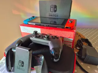Nintendo Switch Azul/Rojo(UK) + Accesorios