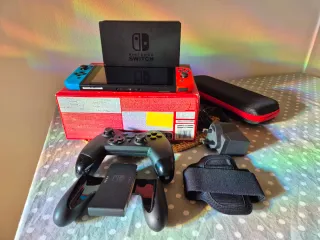 Nintendo Switch Azul/Rojo(UK) + Accesorios