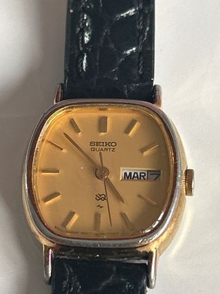 Reloj Seiko Quartz Dorado y Negro