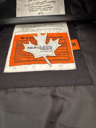 Abrigo acolchado mujer negro y gris