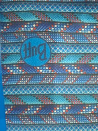 Braga de cuello Buff fina azul y estampados