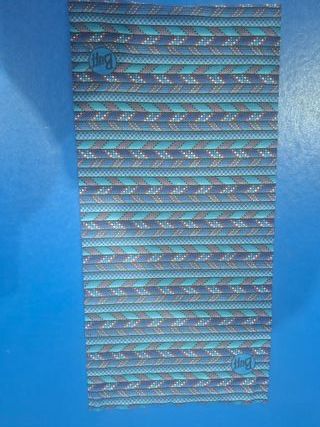 Braga de cuello Buff fina azul y estampados