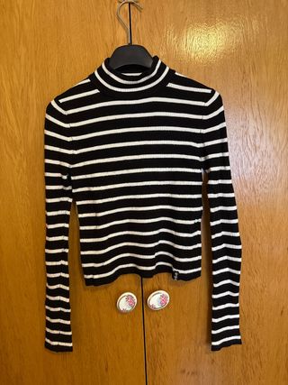 Jersey cuello alto rayas blanco y negro