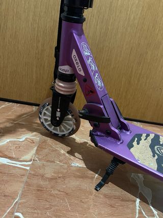 Patinete Oxelo Decathlon Morado. buen estado