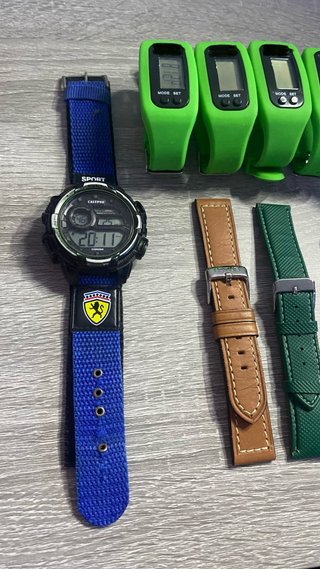 Lote 9 relojes y 2 correas verde y marrón lotus