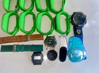 Lote 19 relojes y 2 correas verde y marrón lotus