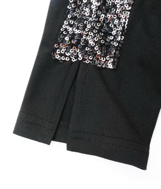 Leggings negros con lentejuelas plateadas