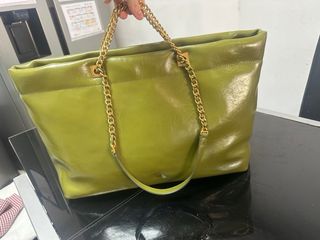 Bolso Purificación Garcia verde y dorado