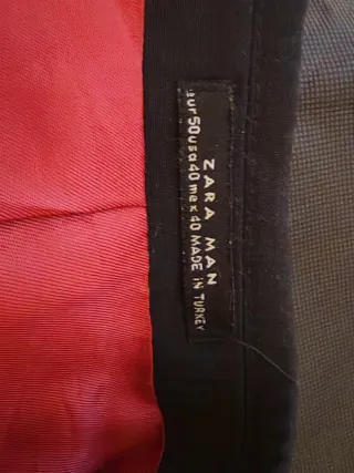 Americana negra con forro rojo