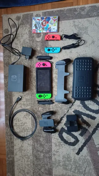 Nintendo switch con accesorios y juego