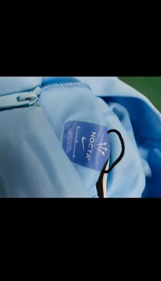 Conjunto Nike nocta azul con capucha