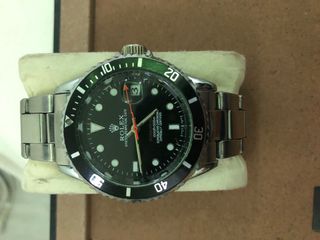 Reloj Rolex Automático plateado y negro