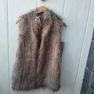 Chaleco de plumas t.42