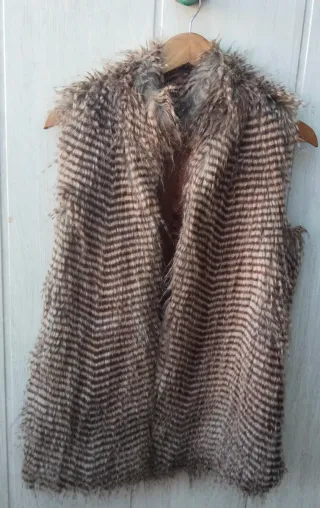 Chaleco de plumas t.42