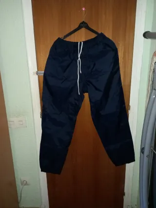 Pantalón de plástico azul