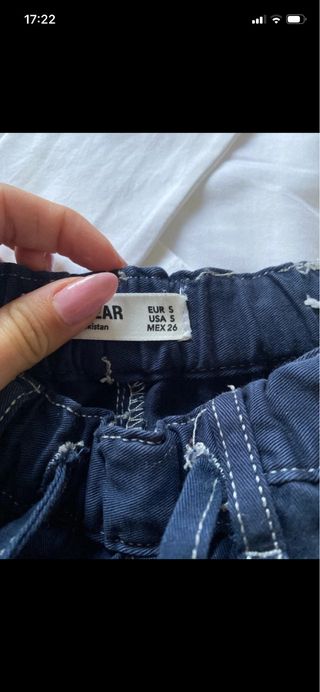 Conjunto: Camiseta, pantalón, zapatillas y bolso