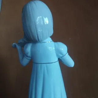 Figura porcelana chica violinista.