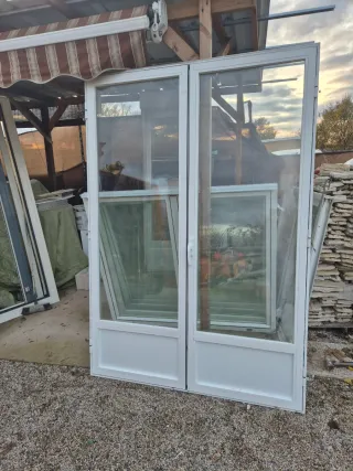 Puerta balconera doble lacada blanca