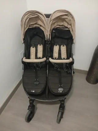 Carro gemelar Niu con funda para lluvia