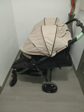 Carro gemelar Niu con funda para lluvia