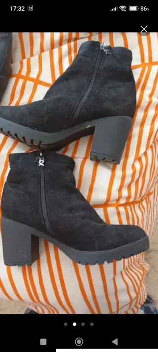 Botines de piel negros Xti