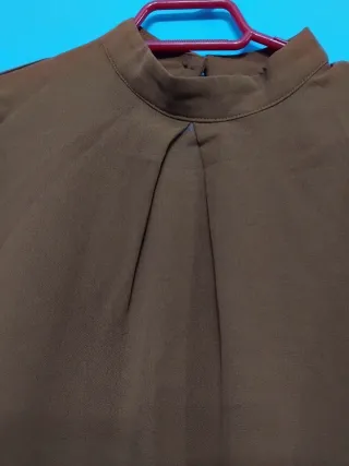 Blusa manga larga marrón nueva