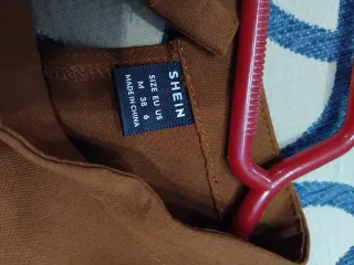 Blusa manga larga marrón nueva