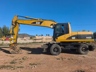 Excavadora de ruedas CATERPILLAR M322C