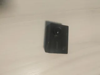 Cámara de acción GoPro negra con soporte