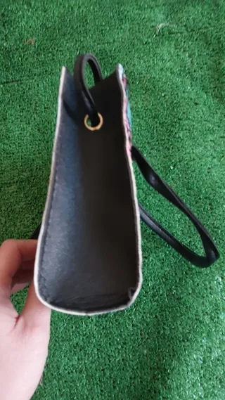 Bolso multicolor con estampado de serpiente