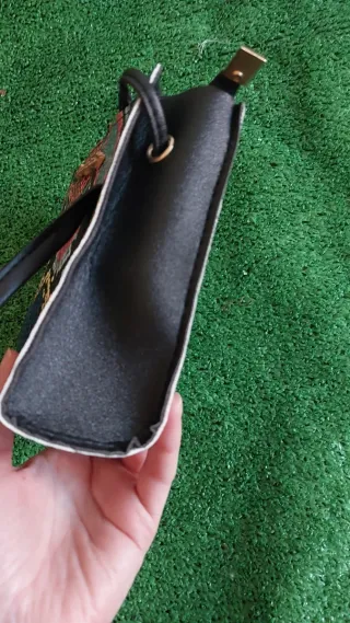 Bolso multicolor con estampado de serpiente