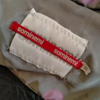 Chaqueta americana negra con detalles