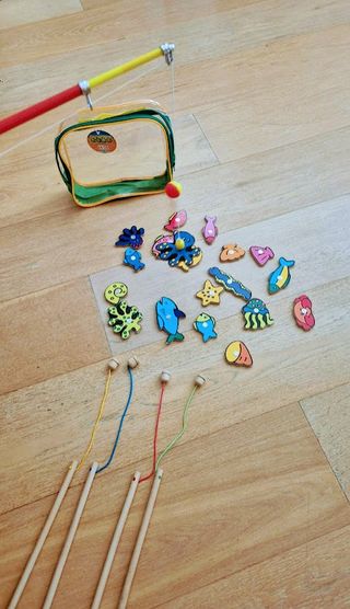 Gioco di pesca con canna e pesci