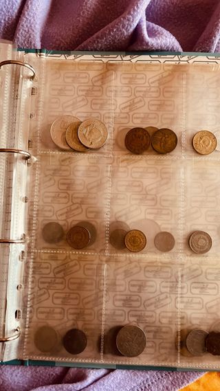 Album raccoglitore monete comprensivo di monete