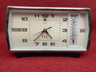 Vintage reloj despertador de cuerda con termómetro