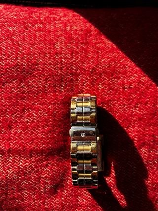 Reloj Titan Dorado y Plateado