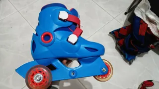 Patines Oxelo niño talla 26-28 + protecciones